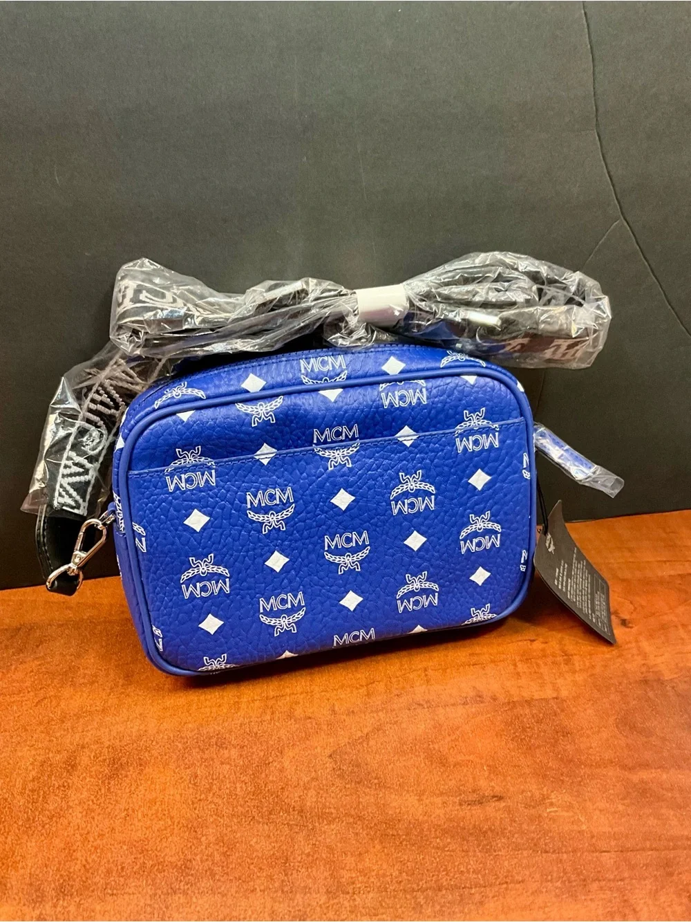 MCM Royal Blue Visetos Logo Messenger Bag, with Polished Metal Logo Plaque